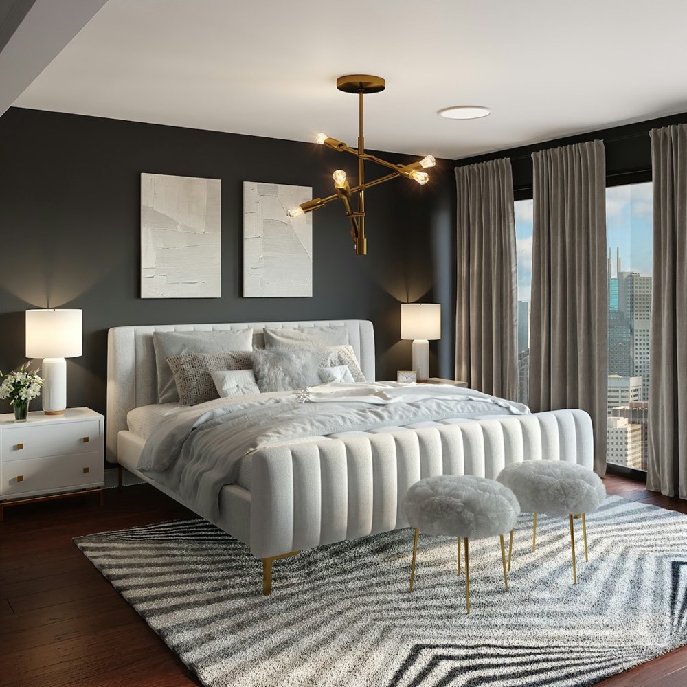 Bedroom with a dark feature wall and gold pendant light