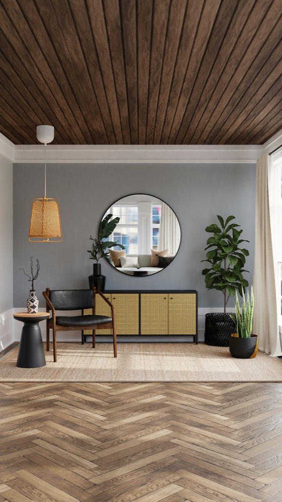 Entrance foyer with herringbone floor and round mirror
